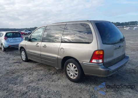 2001 Ford Windstar Limited z USA, uszkodzony, nr VIN 2FMDA584X1BB06423